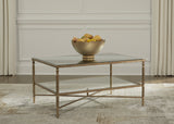 Cloverty Coffee Table with Mirrored Top in Aged Gold Finish