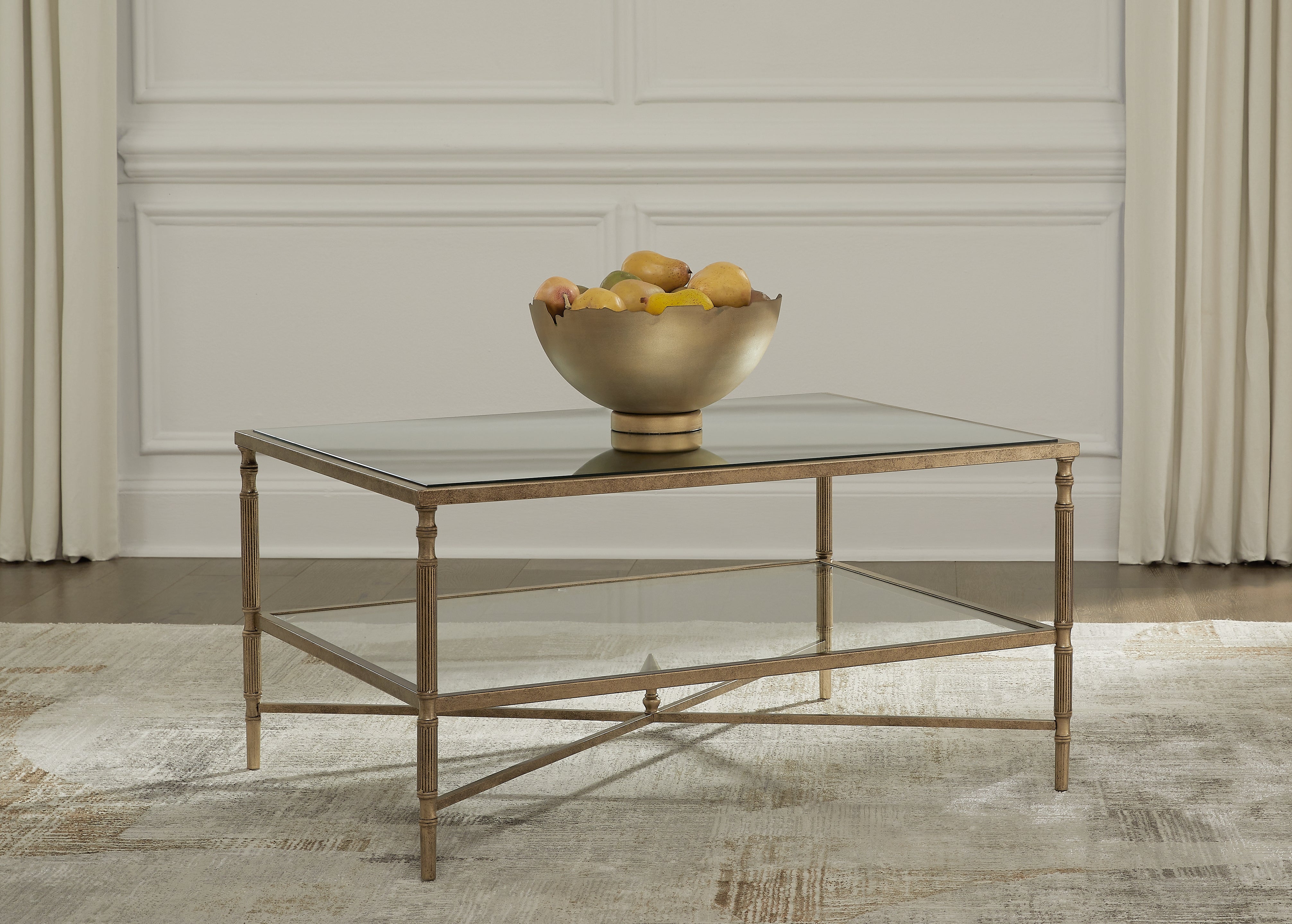 Cloverty Coffee Table with Mirrored Top in Aged Gold Finish